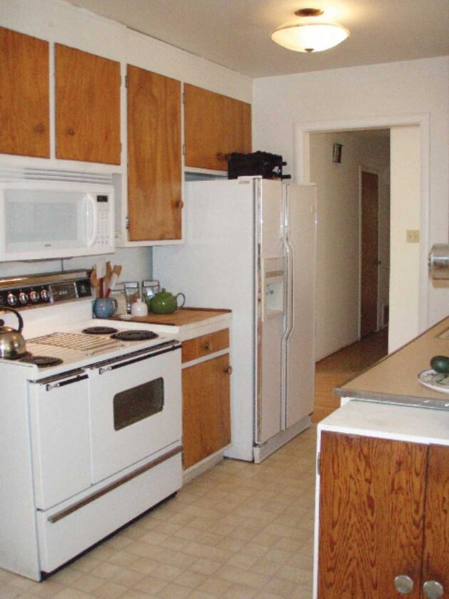 The kitchen is cramped and dark.